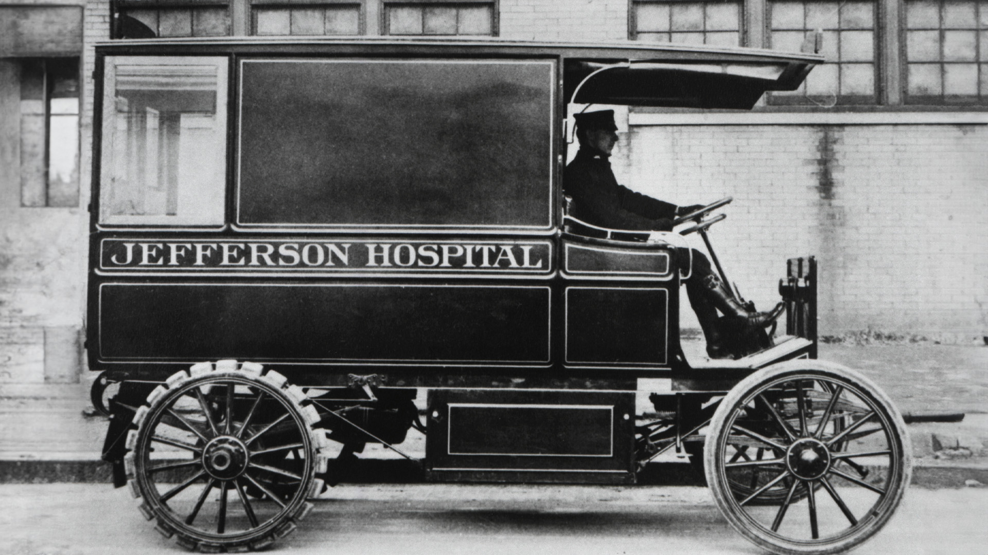 Historical image of the mobile Jefferson Hospital ambulance.