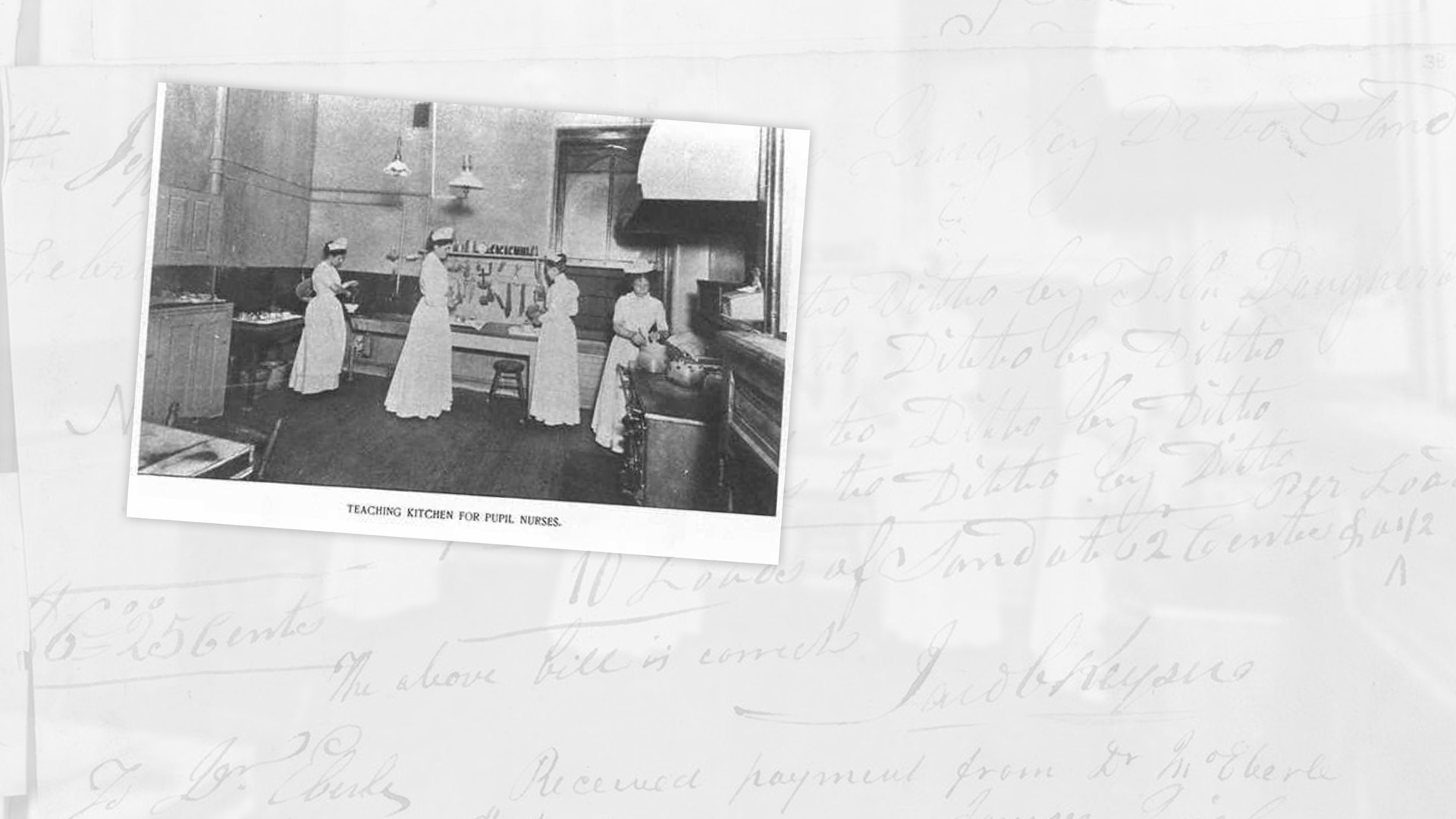 Interior view showing four student nurses preparing meals in the teaching kitchen of the 1877 Hospital.