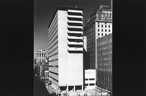 View of southwest corner of nearly completed hospital pavilion, with view up 11th Street.