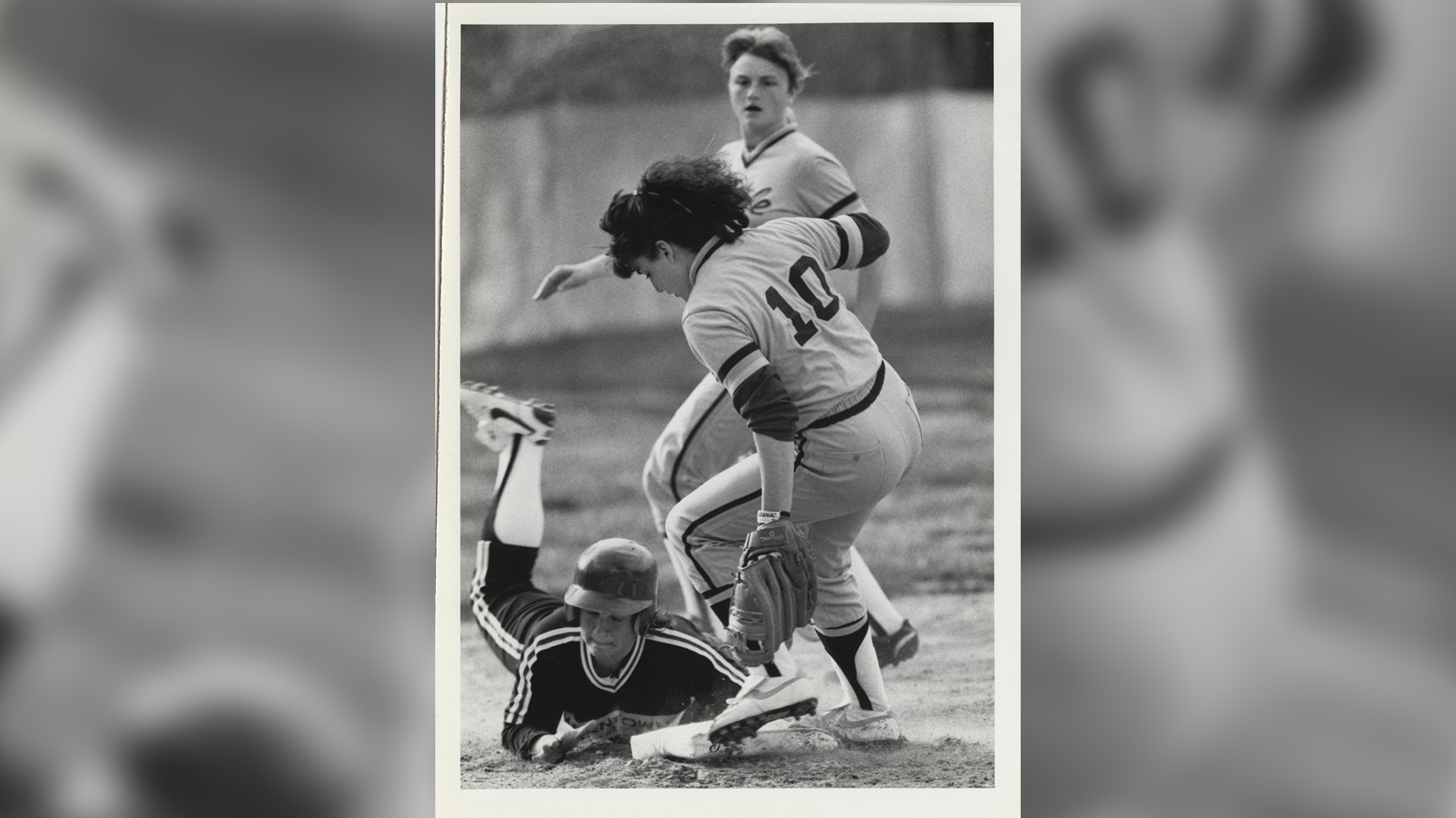 Women's softball action shot circa 1980s