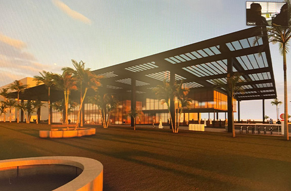 A rendering of the Sheba Medical Entrance depicting large open spaces, palm trees and lots of windows.